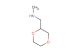 [(1,4-dioxan-2-yl)methyl](methyl)amine